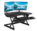 Rocelco 46" Height Adjustable Corner Standing Desk Converter with AC Outlet USB Charger and Dual Monitor Arm Mount - Stand Up Tabletop Riser Workstation - Keyboard Tray - Black (R CADRB-46-ACUSB-DM2)